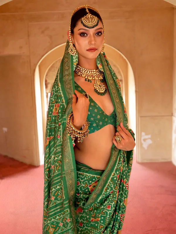 Green festive wear patola silk saree