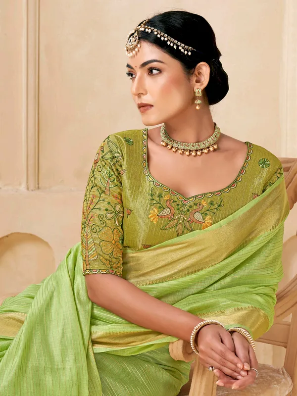 Green festive wear saree in viscose