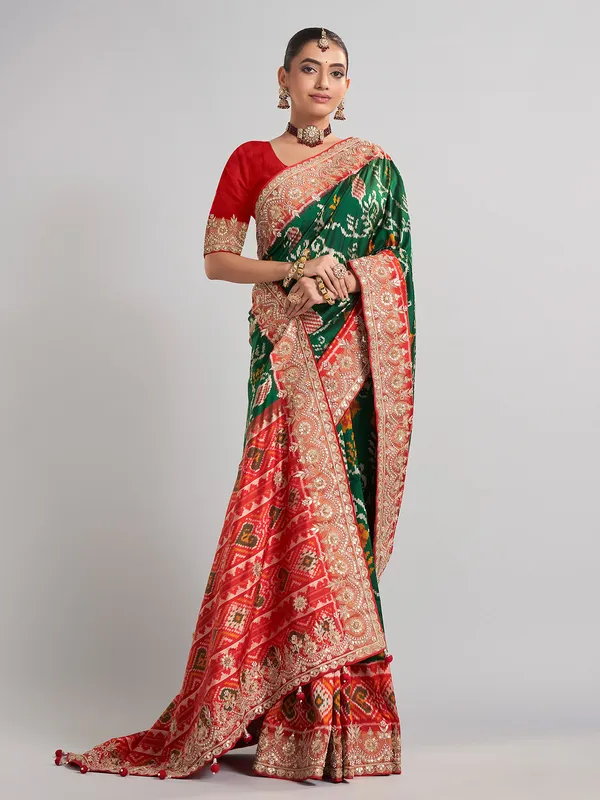 Green hyderabadi patola silk saree with contrast border work