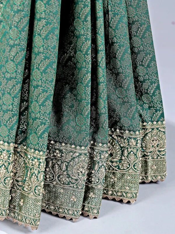 Green kanjivaram saree with wedding embellishments