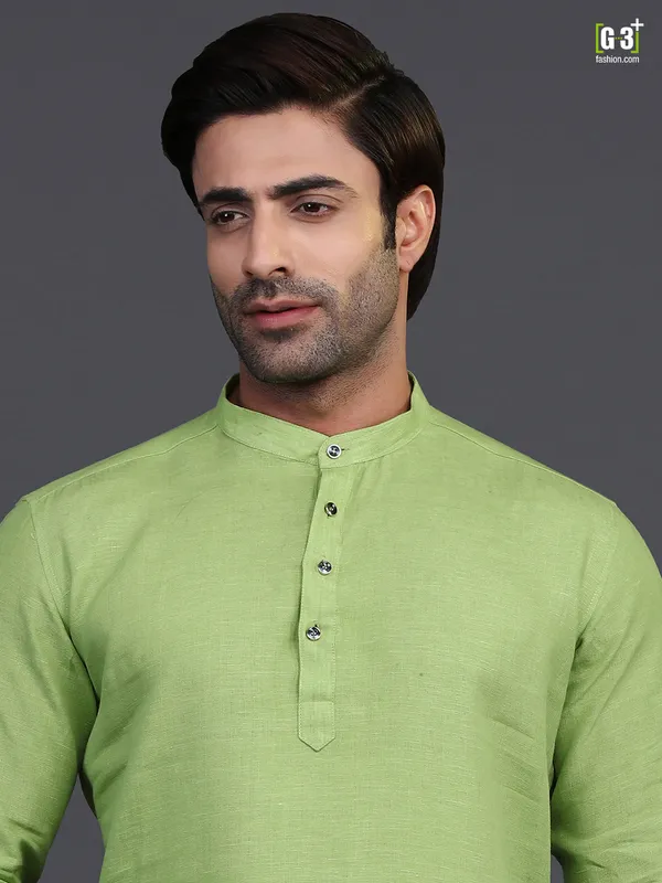Green linen kurta suit for festive wear