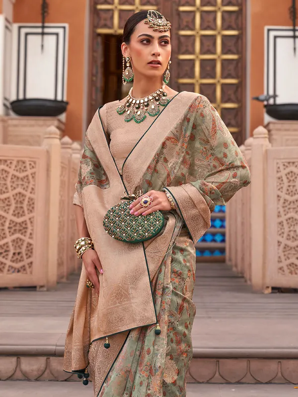Green organza saree with lush festive shine
