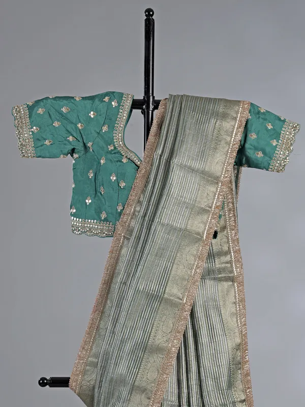 Green organza saree with ready made blouse