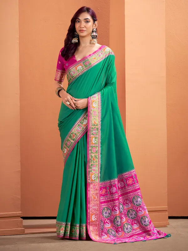 Green patola silk saree with festive radiance