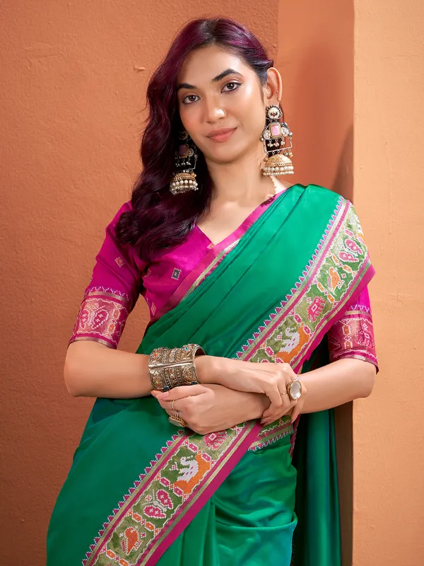 Green patola silk saree with festive radiance