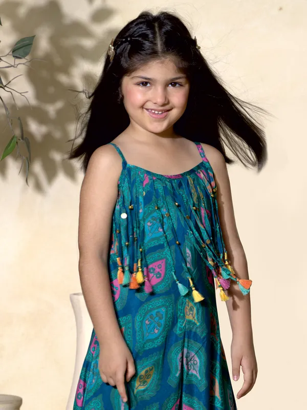 Green printed jumpsuit with coin embellishments