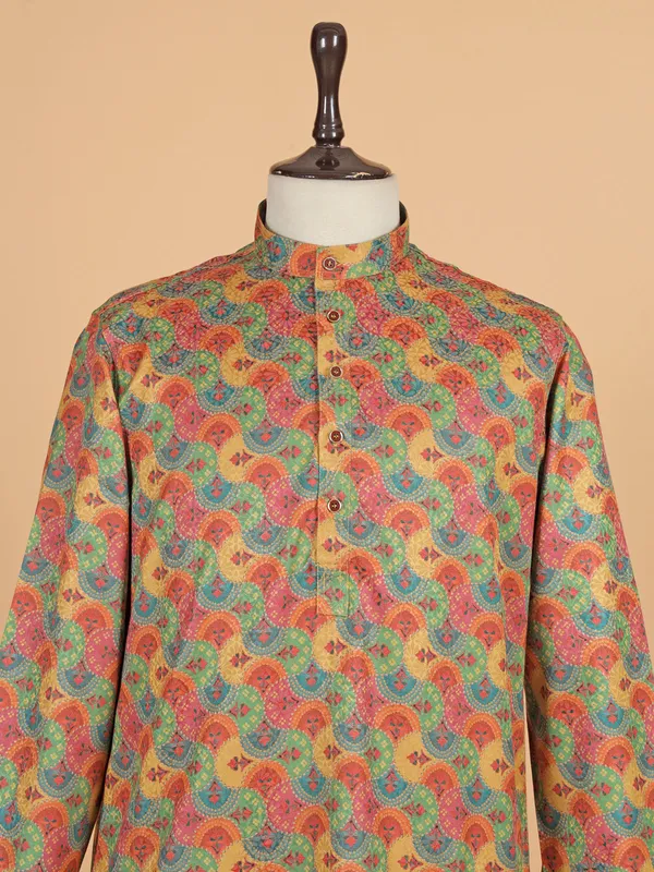 Green printed kurta suit for festive
