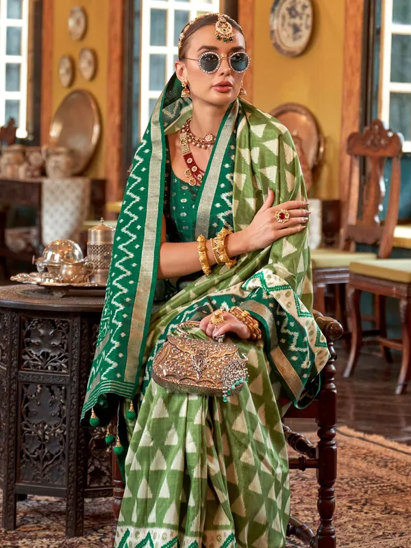 Green printed silk saree with zari work for women