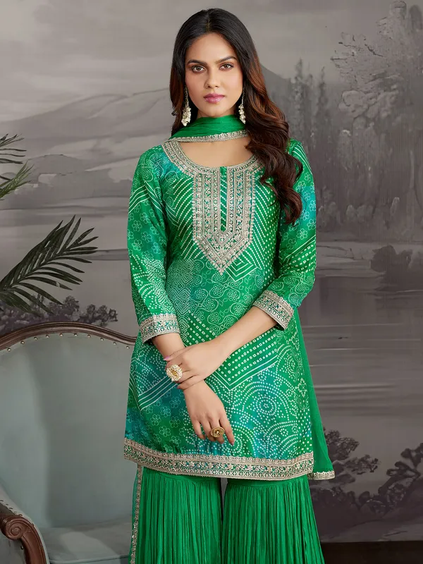 Green printed silk sharara suit with dupatta