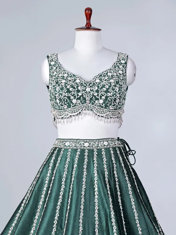 Green raw silk lehenga choli with stone work