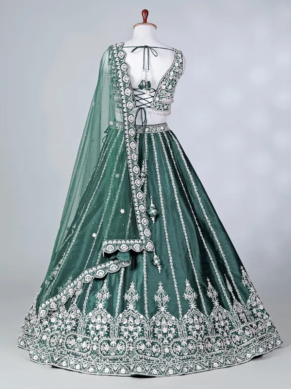 Green raw silk lehenga choli with stone work
