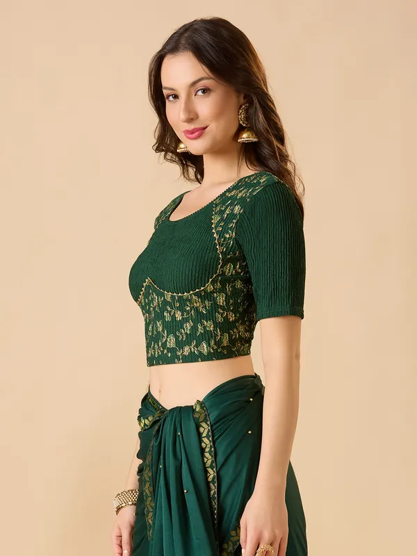 Green round neck lycra ready made blouse with zari work