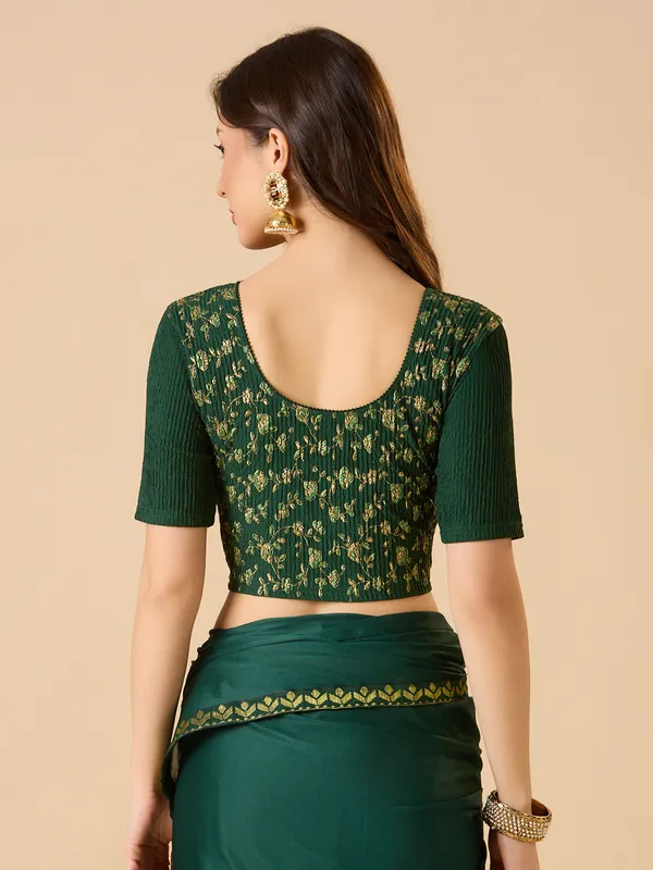 Green round neck lycra ready made blouse with zari work