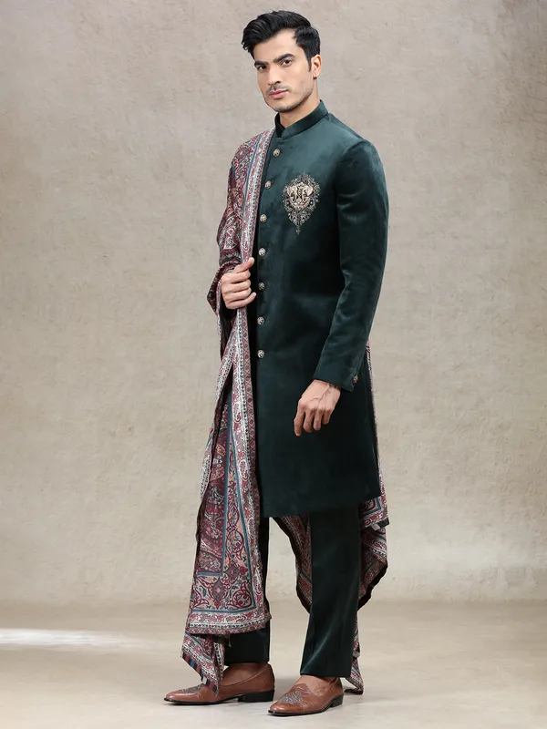 Green royal charming velvet sherwani with elephant patch