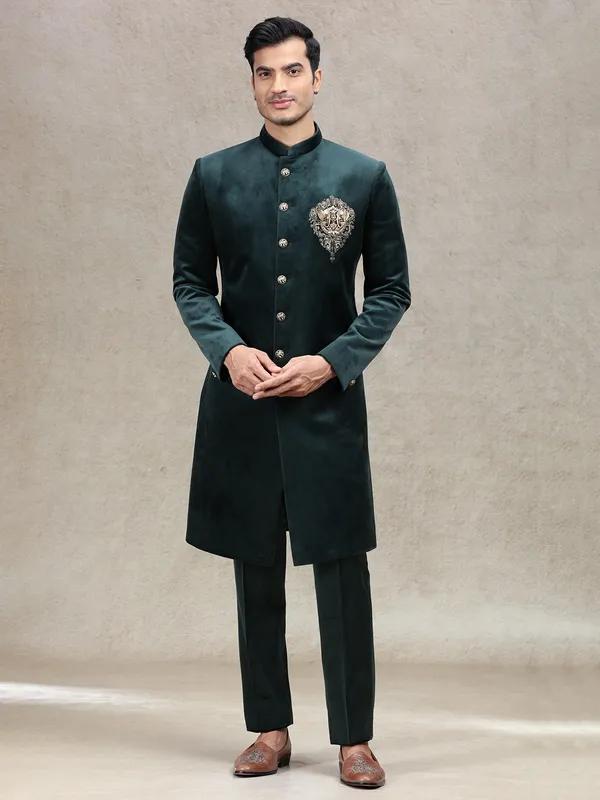 Green royal charming velvet sherwani with elephant patch