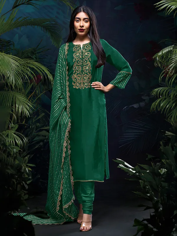 Green salwar suit in silk with dupatta for festive wear