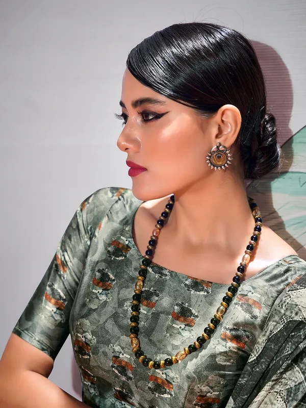 Green satin saree in printed