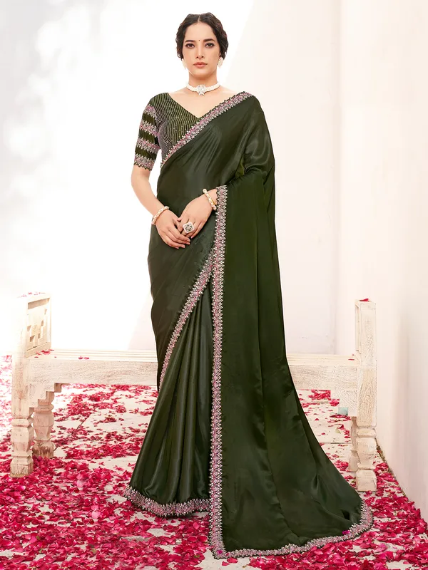 Green satin silk saree with stones zari detailing