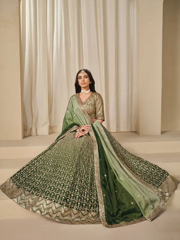 Green sequins worked silk lehenga choli