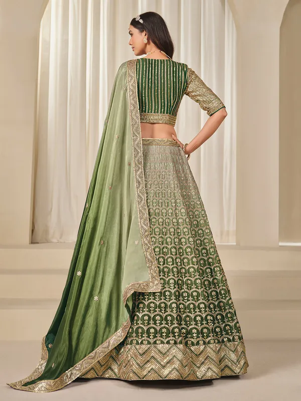 Green sequins worked silk lehenga choli