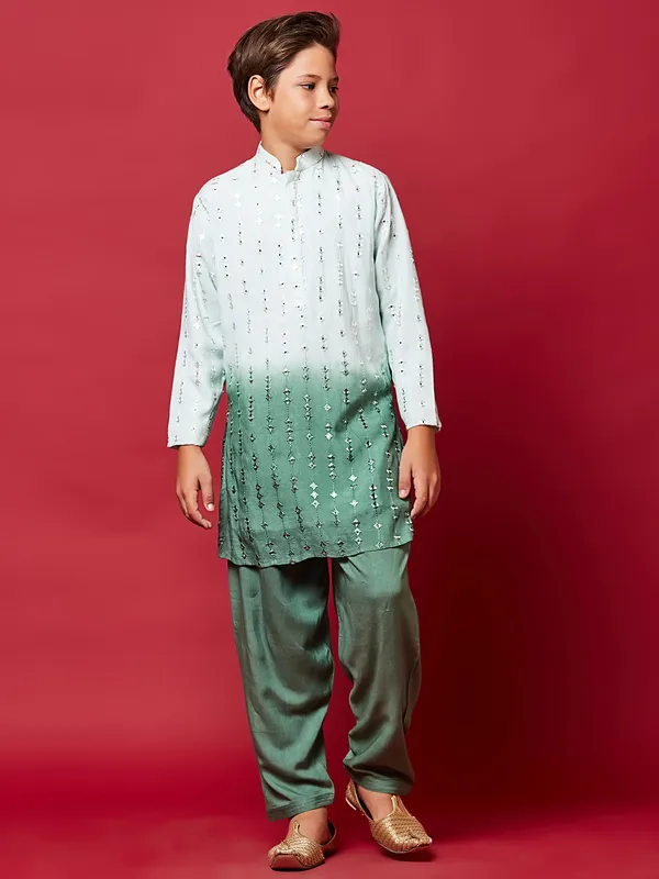 Green shaded silk kurta suit for festive