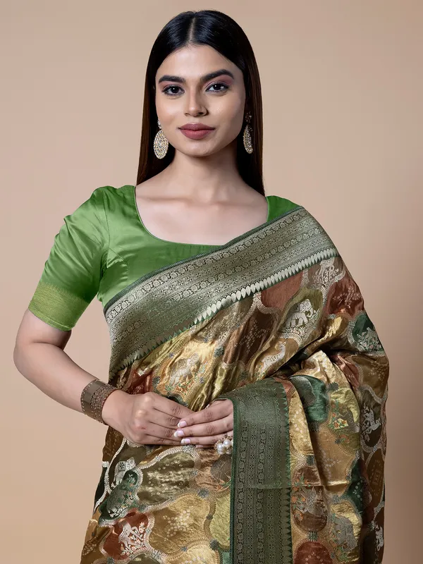 Green shaded dola silk zari weaving saree