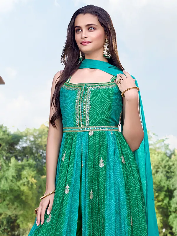 Green silk anarkali palazzo suit with zardosi accents