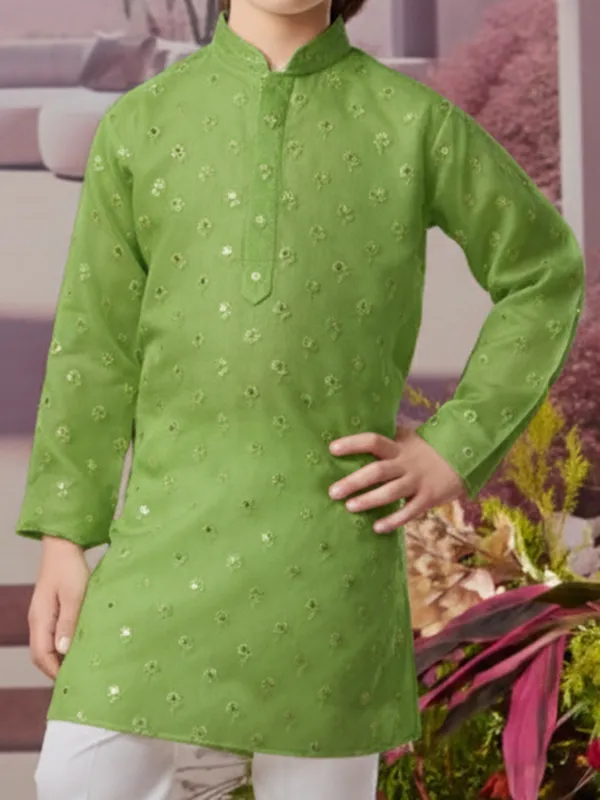 Green silk kurta set with elegant sparkle
