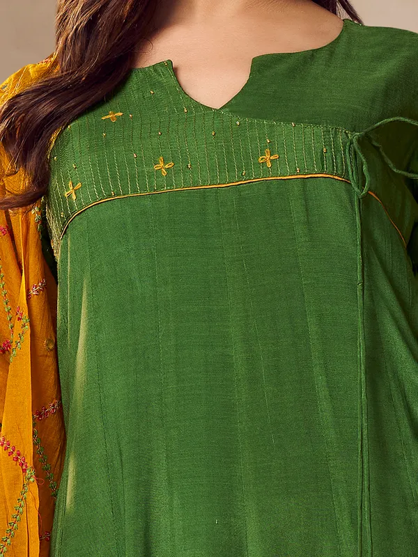 Green silk kurti set with thread work
