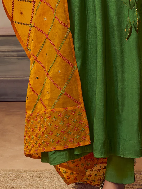 Green silk kurti set with thread work