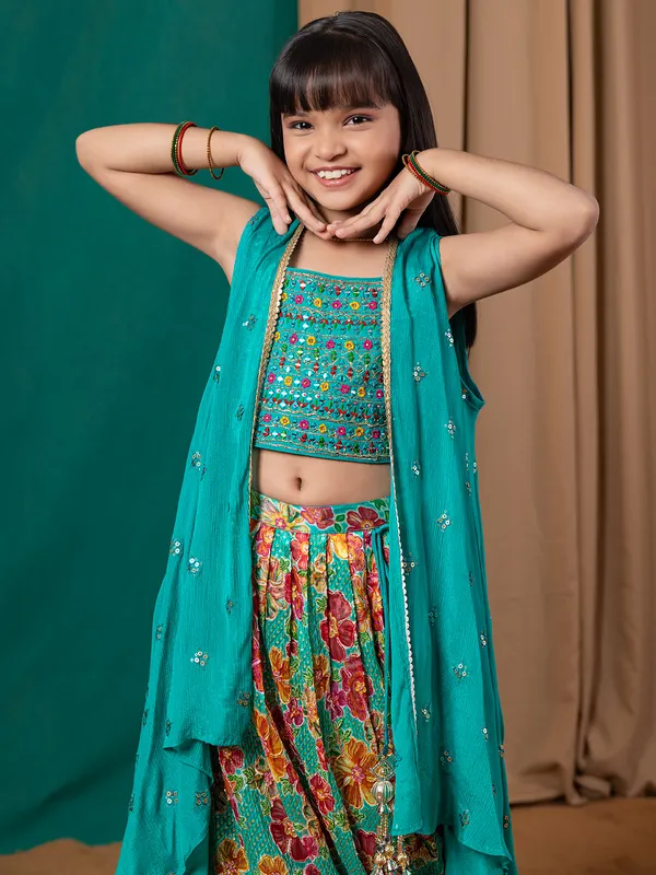 Green silk lehenga choli with gorgeaous shrug