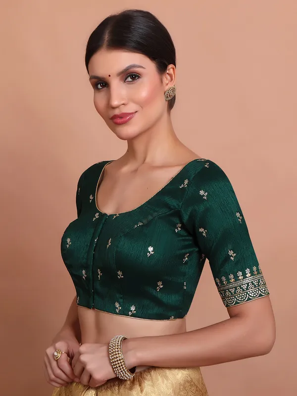 Green silk round neck blouse with sequin work