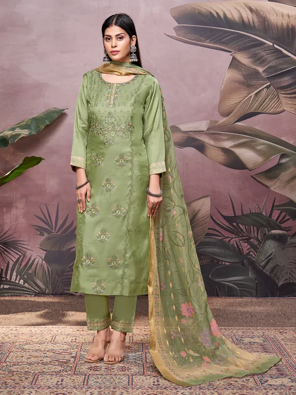 Green silk salwar suit with embroidery