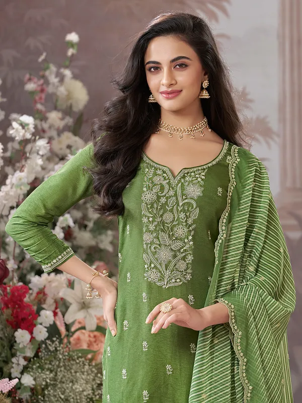 Green silk salwar suit with printed dupatta elegant outfit