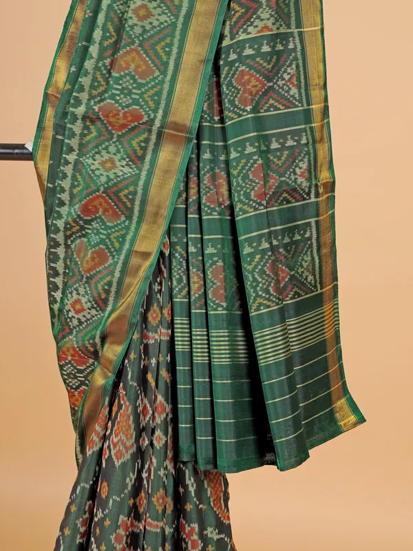 Green silk saree in bandhej print for wedding