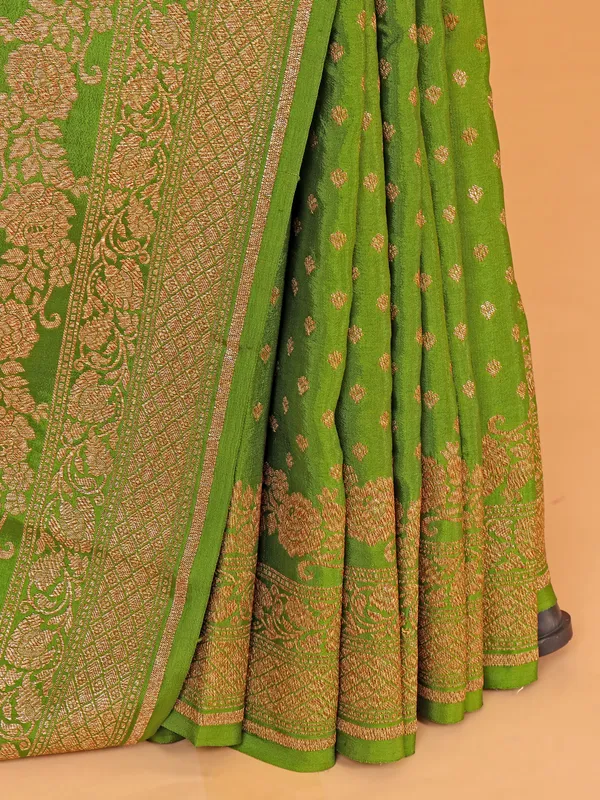 Green silk saree with contrast blouse
