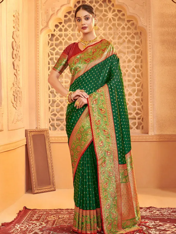 Green silk saree with contrast red blouse