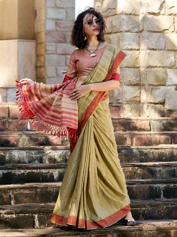 Green silk saree with radiant zari weave
