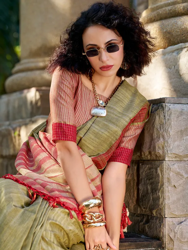 Green silk saree with radiant zari weave
