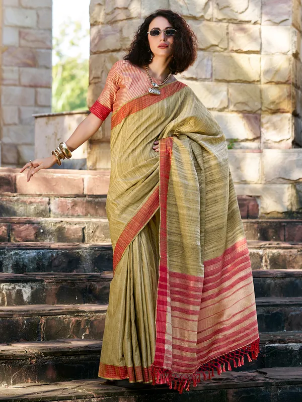 Green silk saree with radiant zari weave