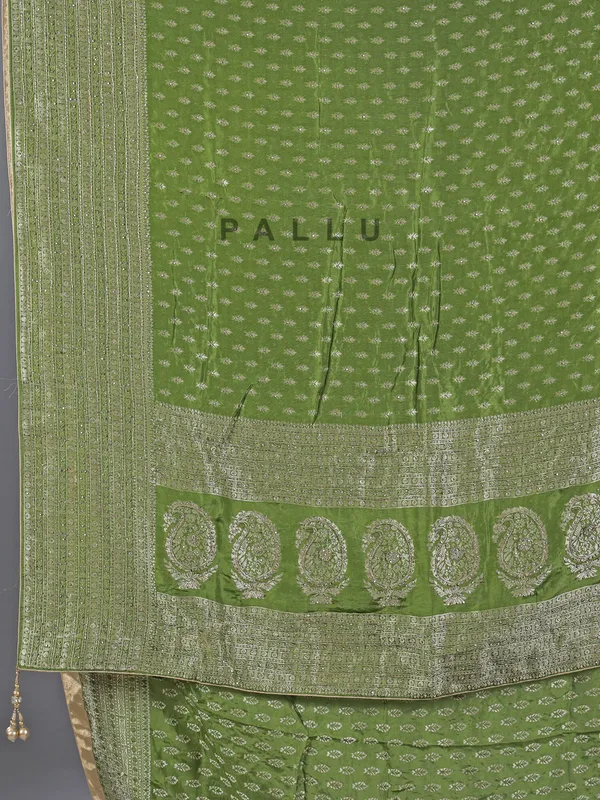 Green silk saree with rich zari motifs