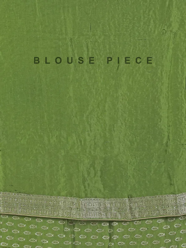 Green silk saree with rich zari motifs