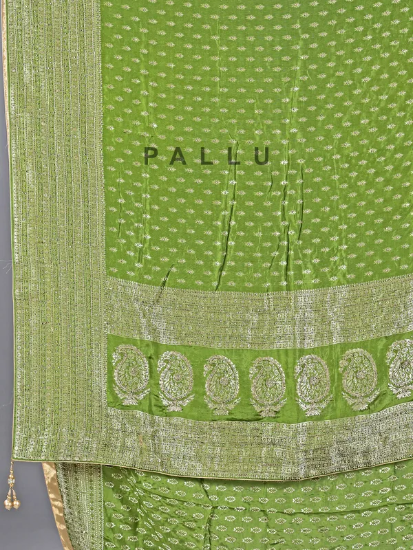 Green silk saree with rich zari motifs
