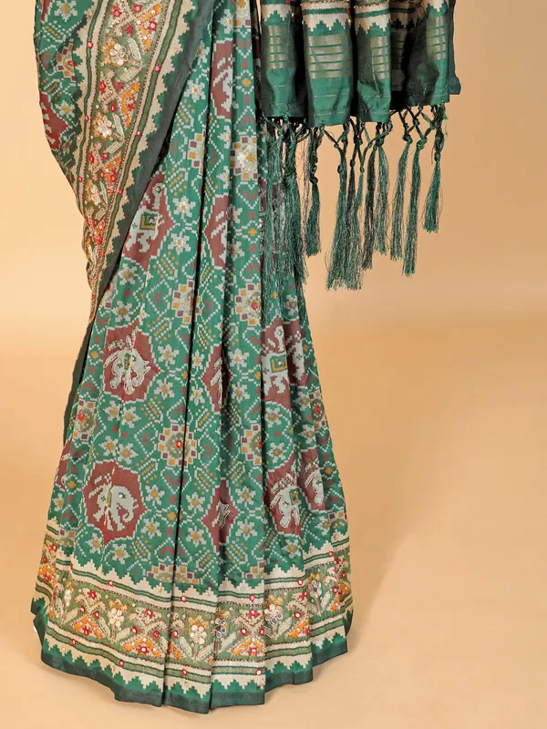 Green silk with patola printed saree for festive