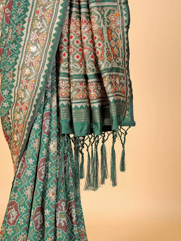 Green silk with patola printed saree for festive