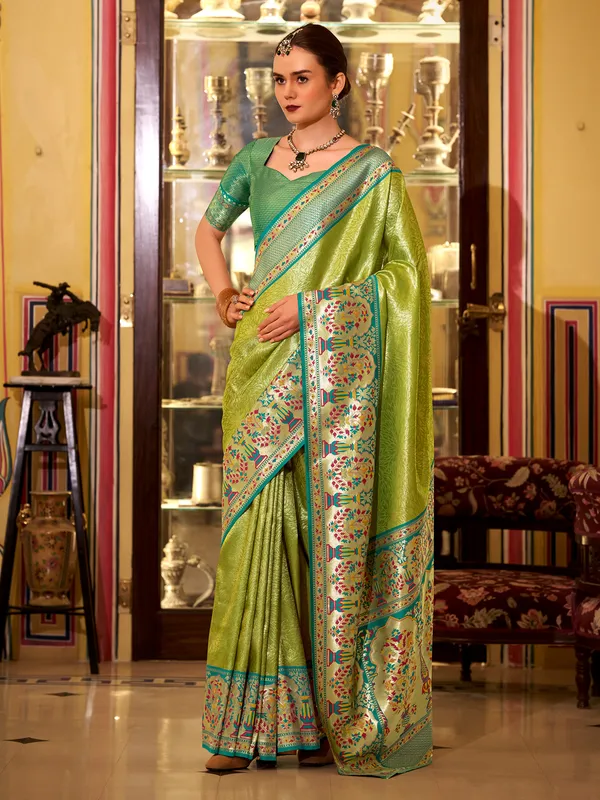 Green tissue silk saree with printed zari weaving