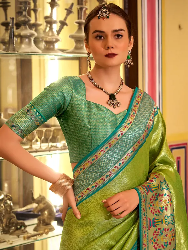Green tissue silk saree with printed zari weaving