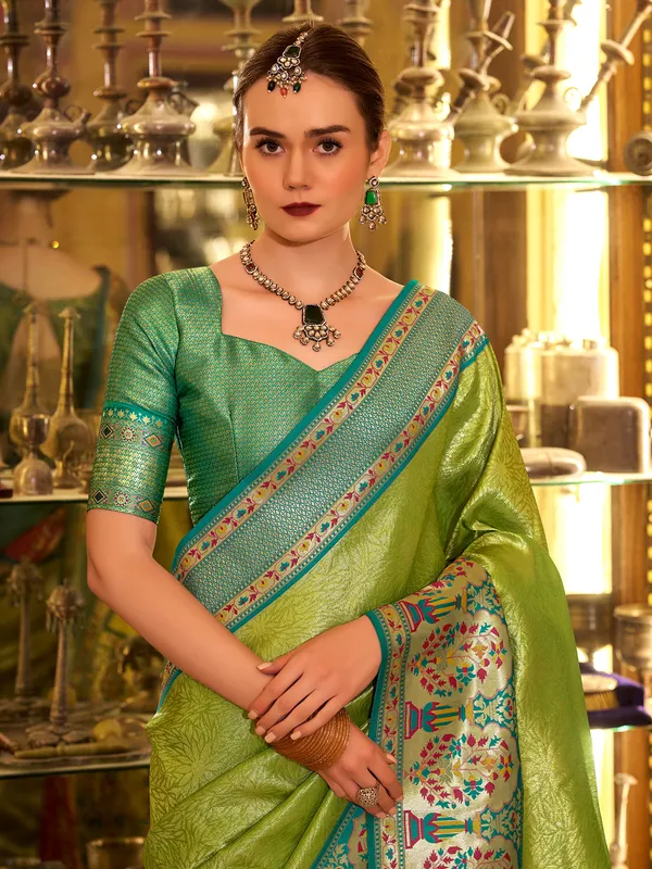 Green tissue silk saree with printed zari weaving