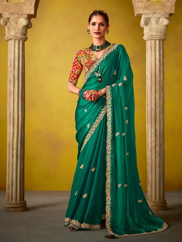 Green tissue silk saree with resham work