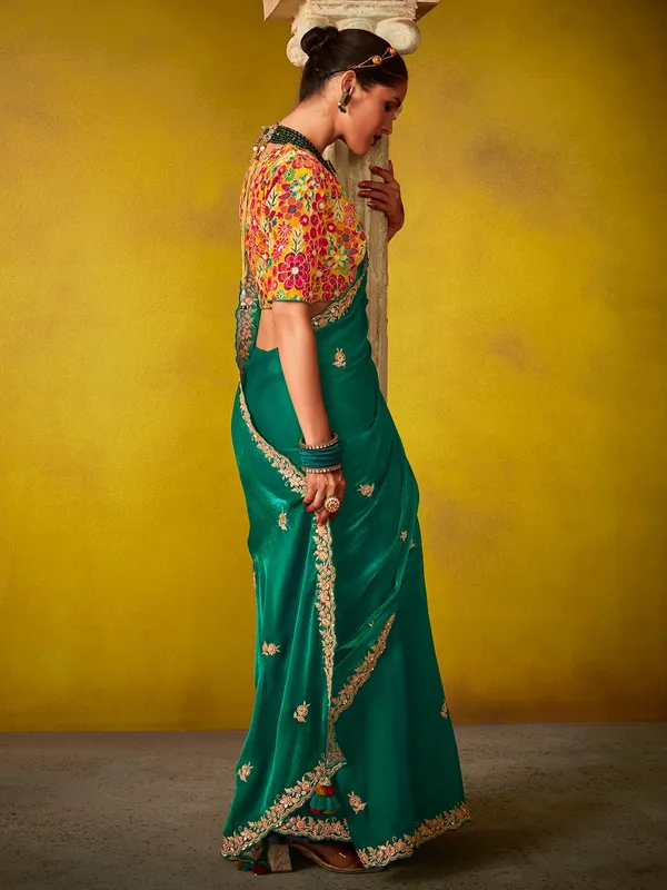 Green tissue silk saree with resham work